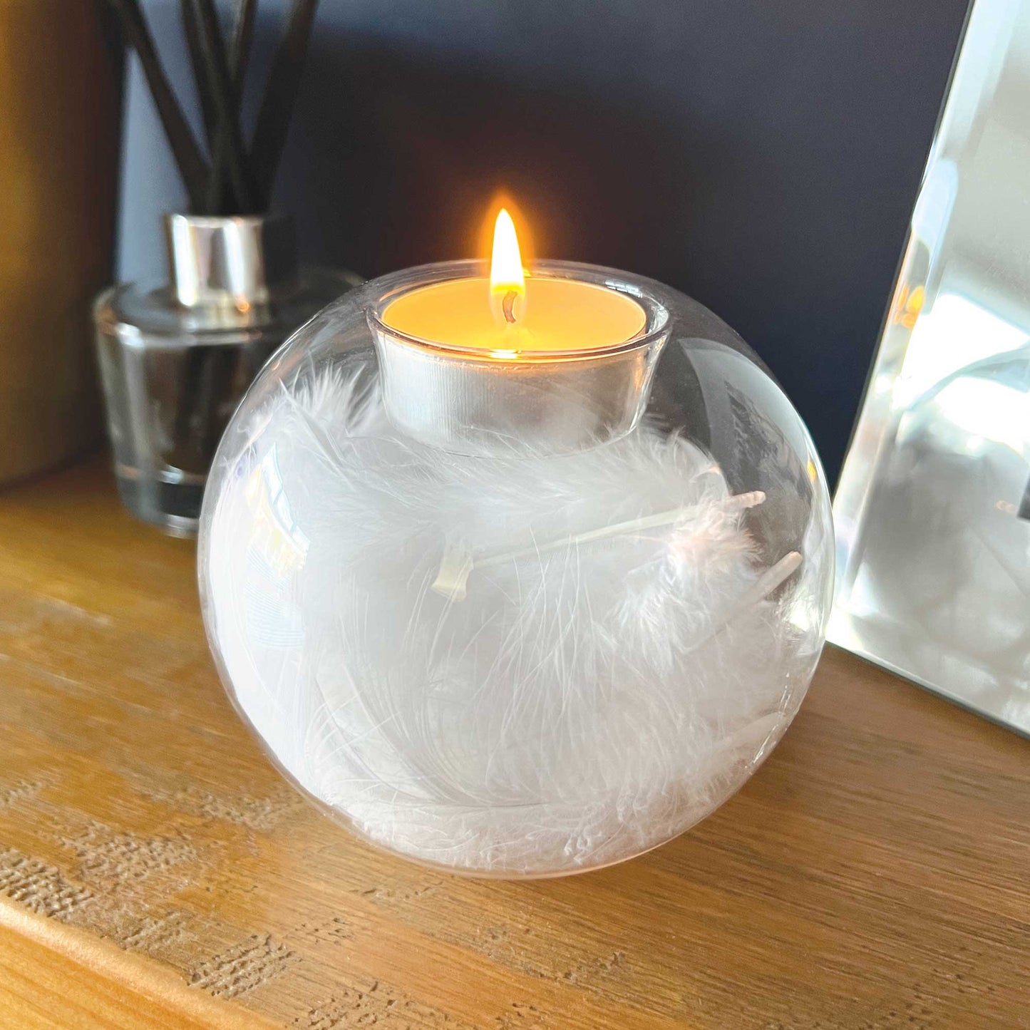 Glass Feather Filled Tea Light Holder