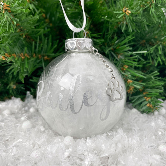 Personalised White Feather Filled Glass Pet Memorial Bauble With Paw Charm