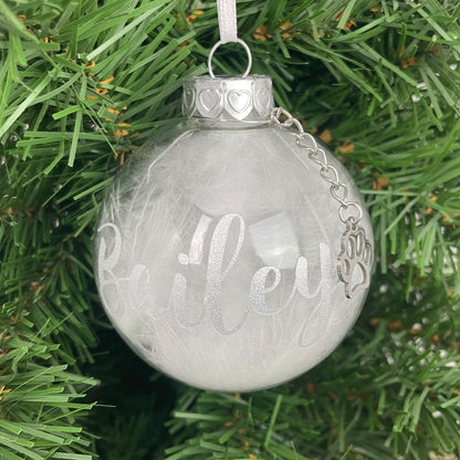 Personalised White Feather Filled Glass Pet Memorial Bauble With Paw Charm