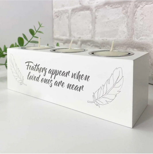 'Feathers Appear' white wooden triple tea light holder